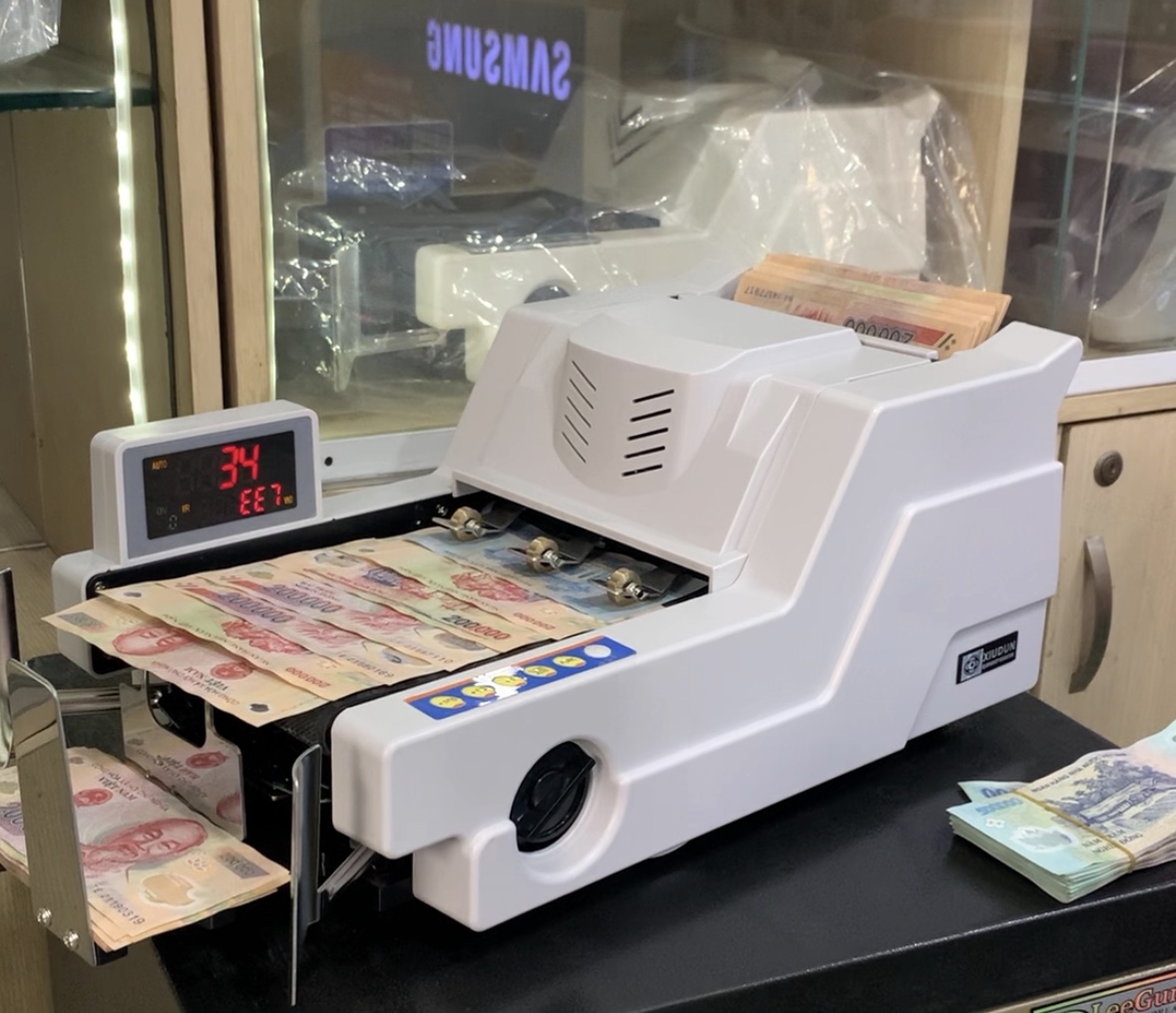 Sửa Máy Đếm Tiền Tại Dĩ An Uy Tín, Giá Rẻ -Hoàng Tín